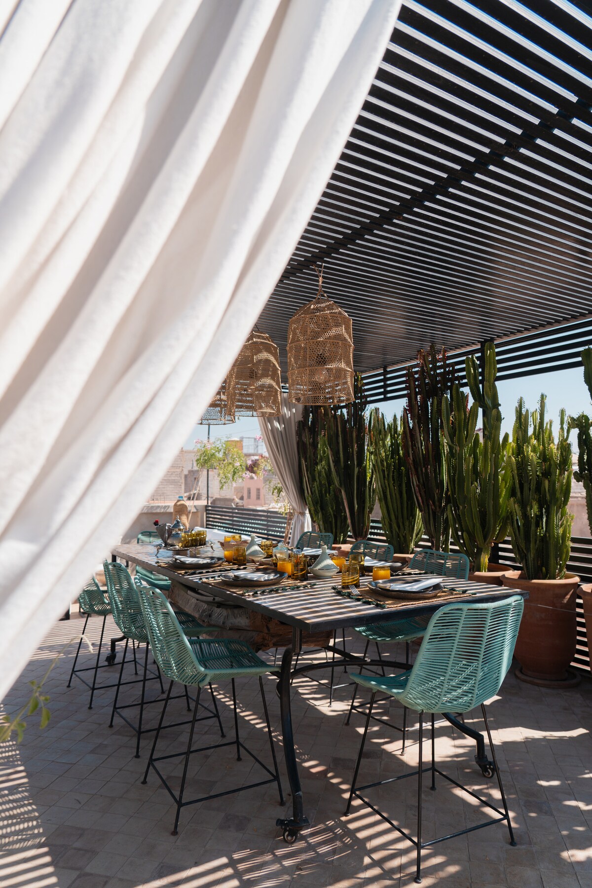 Riad Della courtyard with orange trees and mint tea